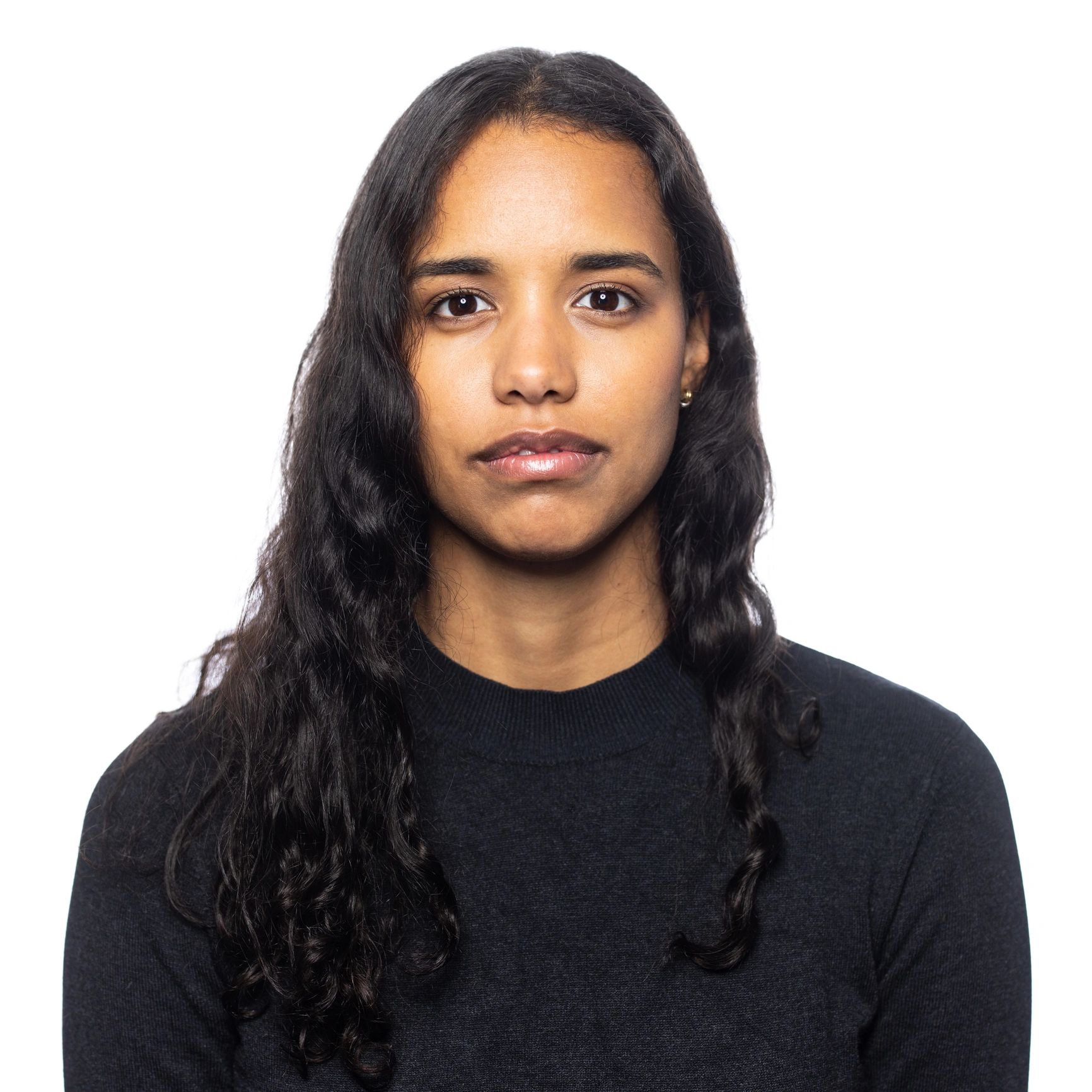 Professional headshot of a businesswoman in a studio portrait